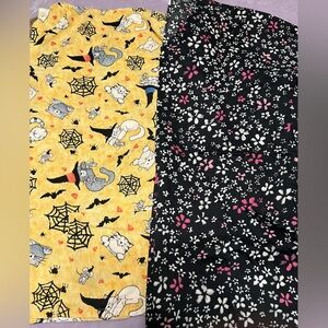 2 women’s scrub tops